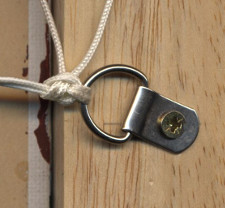 A large view of a d_ring to use as a hanging device on the reverse of a picture frame.